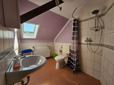 Ein Badezimmer in der Unterkunft Pension Zur Kutscherstube
