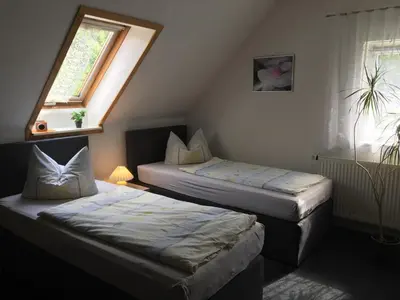 Ein Bett oder Betten in einem Zimmer der Unterkunft Ferien in Sachsen