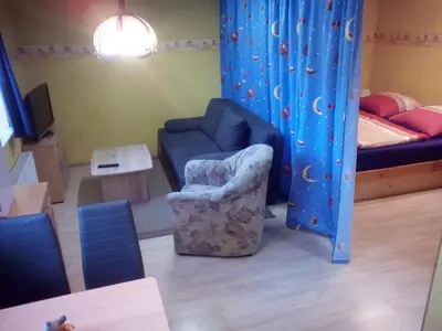 Ein Bett oder Betten in einem Zimmer der Unterkunft Ferienwohnung Eulitz