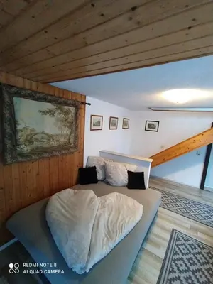 Ein Bett oder Betten in einem Zimmer der Unterkunft Elbenland Apartments & Bungalows