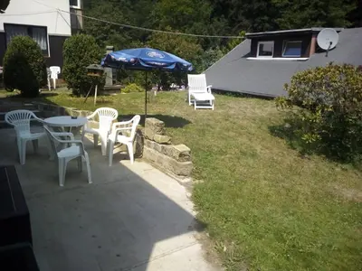 Ein Garten an der Unterkunft Elbenland Apartments & Bungalows