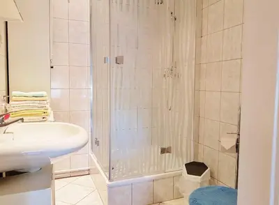 Ein Badezimmer in der Unterkunft Bungalow Krzyzaniak