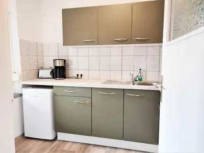 Küche/Küchenzeile in der Unterkunft Bungalow Krzyzaniak