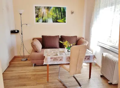 Ein Sitzbereich in der Unterkunft Bungalow Krzyzaniak