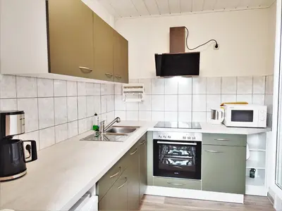 Küche/Küchenzeile in der Unterkunft Bungalow Krzyzaniak