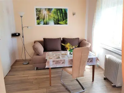 Ein Sitzbereich in der Unterkunft Bungalow Krzyzaniak