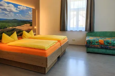 Ein Bett oder Betten in einem Zimmer der Unterkunft Ferienwohnungen Ender