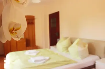Ein Bett oder Betten in einem Zimmer der Unterkunft Ferienhaus Mühlberg
