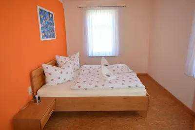 Ein Bett oder Betten in einem Zimmer der Unterkunft Cosis Ferienwohnung