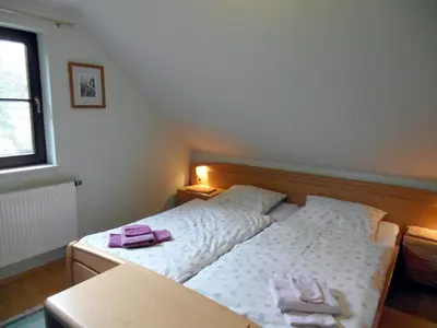 Ein Bett oder Betten in einem Zimmer der Unterkunft Haus Ferienromantik