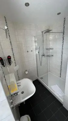 Ein Badezimmer in der Unterkunft Avenue Das Gästehaus