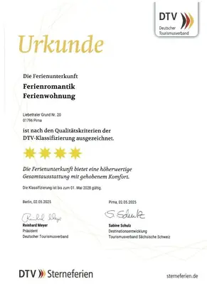 Ein Zertifikat, Auszeichnung, Logo oder anderes Dokument, das in der Unterkunft XXL Ferienwohnung ausgestellt ist