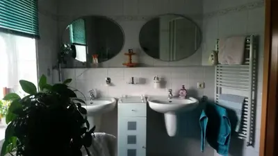 Ein Badezimmer in der Unterkunft Strasse des Friedens