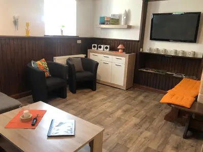 Ein Sitzbereich in der Unterkunft Ferienhaus Tooren