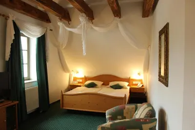 Ein Bett oder Betten in einem Zimmer der Unterkunft Hotel Lay-Haus