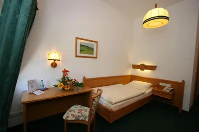 Ein Bett oder Betten in einem Zimmer der Unterkunft Hotel Lay-Haus