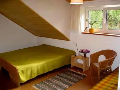 Ein Bett oder Betten in einem Zimmer der Unterkunft Ferienwohnung im DG, Parkplatz vorm Haus, WLAN