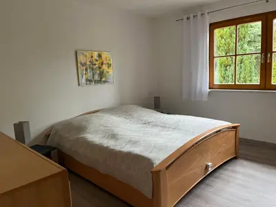 Ein Bett oder Betten in einem Zimmer der Unterkunft Ferienwohnung Unter den Linden