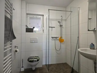Ein Badezimmer in der Unterkunft Ferienwohnungen 