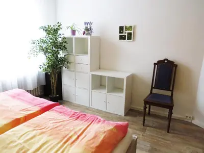Ein Bett oder Betten in einem Zimmer der Unterkunft Hamax