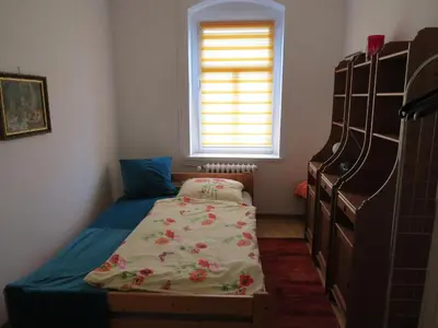 Ein Bett oder Betten in einem Zimmer der Unterkunft Hamax