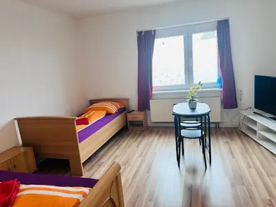 Ein Bett oder Betten in einem Zimmer der Unterkunft Gasthaus Pavillon