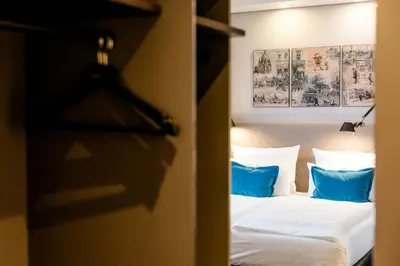 Ein Bett oder Betten in einem Zimmer der Unterkunft Motel One Dresden - Palaisplatz