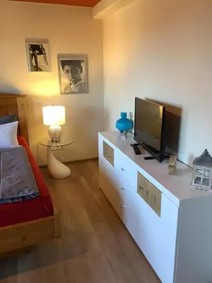 Ein Bett oder Betten in einem Zimmer der Unterkunft Ferienwohnung Himmel und Hölle