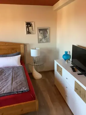 Ein Bett oder Betten in einem Zimmer der Unterkunft Ferienwohnung Himmel und Hölle