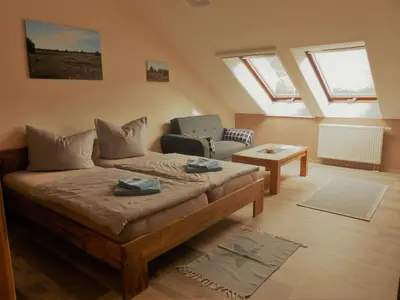 Ein Sitzbereich in der Unterkunft Ferienwohnung Ortrand - Pension