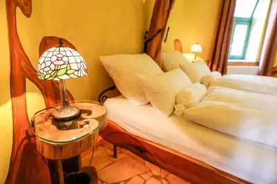 Ein Bett oder Betten in einem Zimmer der Unterkunft Backstage Hotel