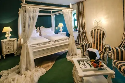 Ein Bett oder Betten in einem Zimmer der Unterkunft Backstage Hotel