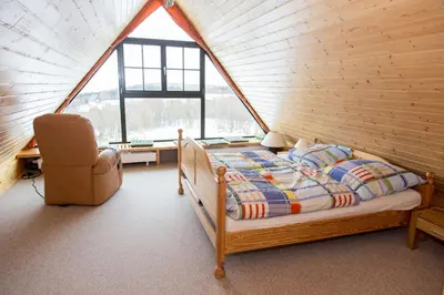 Ein Bett oder Betten in einem Zimmer der Unterkunft Ferienhaus Zinnwald