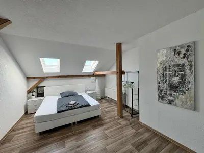 Ein Bett oder Betten in einem Zimmer der Unterkunft ECOVILLA - Natur pur