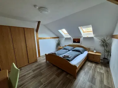 Ein Bett oder Betten in einem Zimmer der Unterkunft ECOVILLA - Natur pur