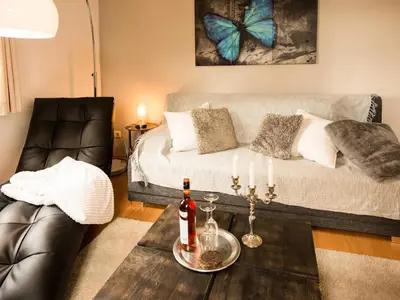 Ein Sitzbereich in der Unterkunft Ferienwohnung am Weissen Hirsch