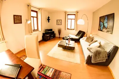 Ein Sitzbereich in der Unterkunft Ferienwohnung am Weissen Hirsch