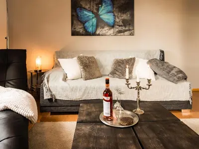 Ein Sitzbereich in der Unterkunft Ferienwohnung am Weissen Hirsch