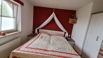 Ein Bett oder Betten in einem Zimmer der Unterkunft Ferienwohnng Sander