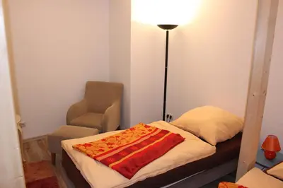 Ein Bett oder Betten in einem Zimmer der Unterkunft Pension Holly