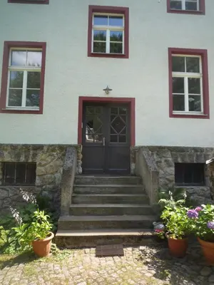 Eine Fassade oder ein Eingang zu Postamt Lauenstein
