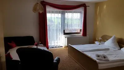 Ein Bett oder Betten in einem Zimmer der Unterkunft Pension Gerlach