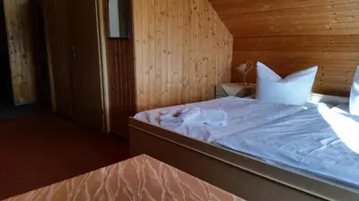 Ein Bett oder Betten in einem Zimmer der Unterkunft Pension Gerlach