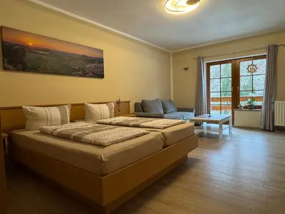 Ein Bett oder Betten in einem Zimmer der Unterkunft Pension Ostrauer Mühle