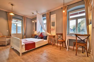 Ein Bett oder Betten in einem Zimmer der Unterkunft Bio-Hotel Villa Waldfrieden