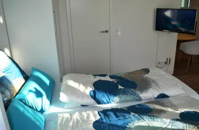 Ein Bett oder Betten in einem Zimmer der Unterkunft Hochlandappartement