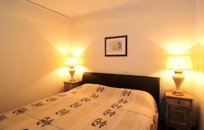 Ein Bett oder Betten in einem Zimmer der Unterkunft City Exklusiv II