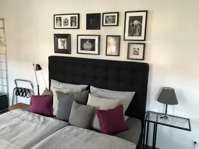 Ein Bett oder Betten in einem Zimmer der Unterkunft Stadthaus Rosengasse