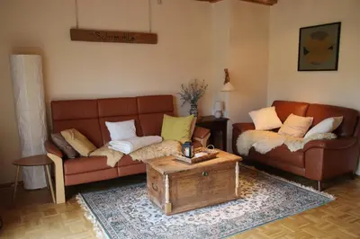 Ein Sitzbereich in der Unterkunft Ferienhaus Sohrmühle