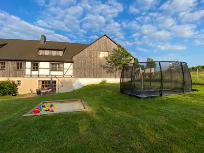 Ein Kinderspielbereich in der Unterkunft Ferienhaus Sohrmühle